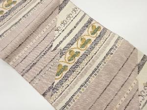 手織り真綿紬変わり横段に唐草・幾何学模様織出し名古屋帯